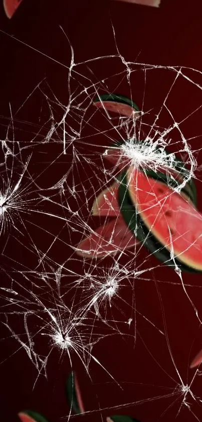 Mobile wallpaper with cracked screen and watermelon slices.