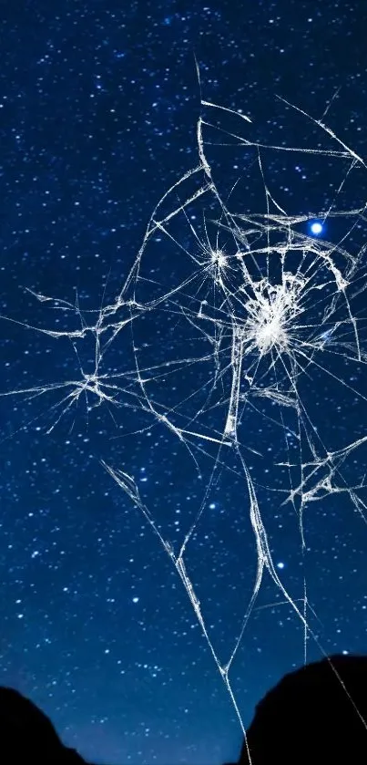 Wallpaper of a starry night sky with a cracked glass effect.