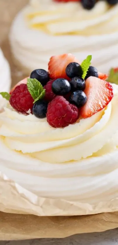 Creamy dessert topped with mixed berries.