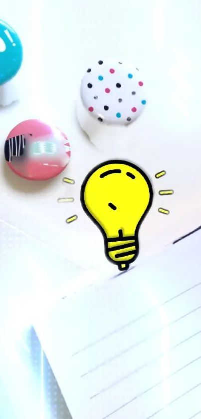 Mobile wallpaper with yellow lightbulb and colorful buttons.