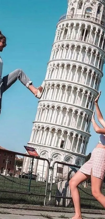 Two people posing creatively with the Leaning Tower of Pisa on a sunny day.