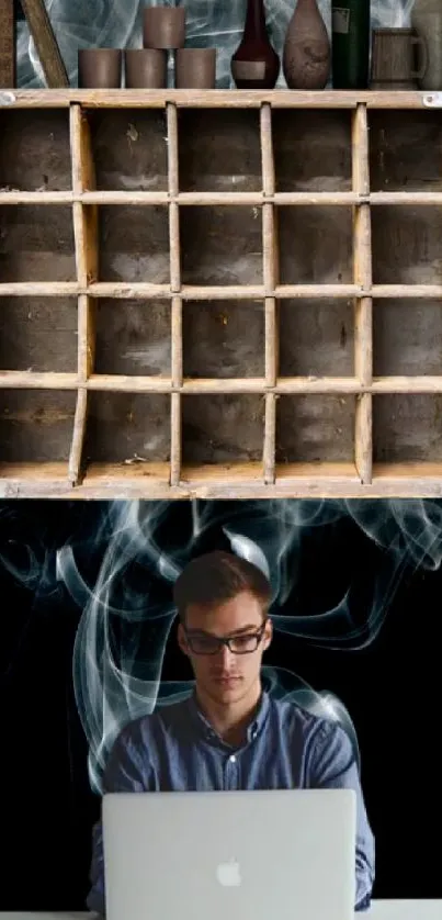 Man working at laptop with vintage shelf above.