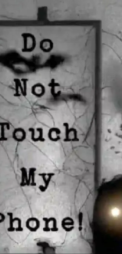 Creepy 'Do Not Touch My Phone' wallpaper with shadowy figure.