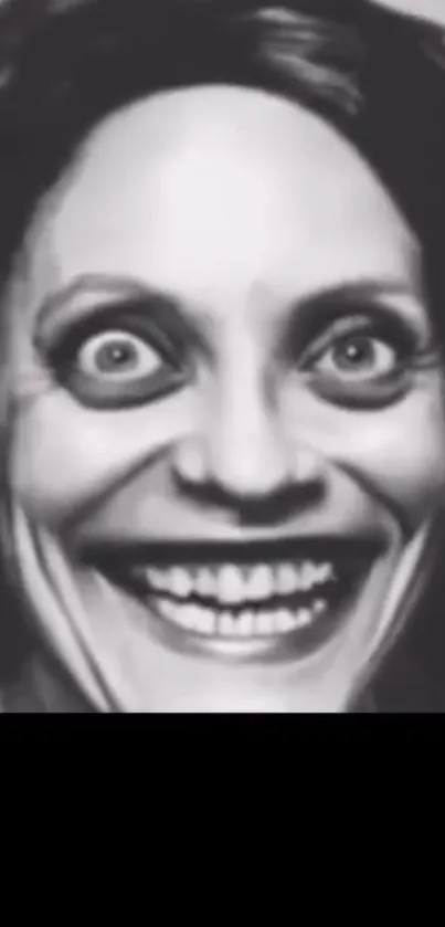 Creepy smiling face with large eyes in black and white.