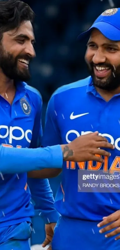 Cricket players in vibrant blue jerseys showing team unity.