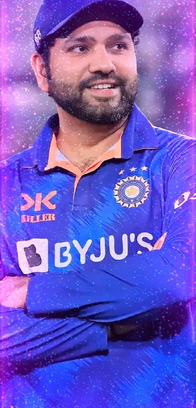 Cricketer wearing Indian team uniform in royal blue.