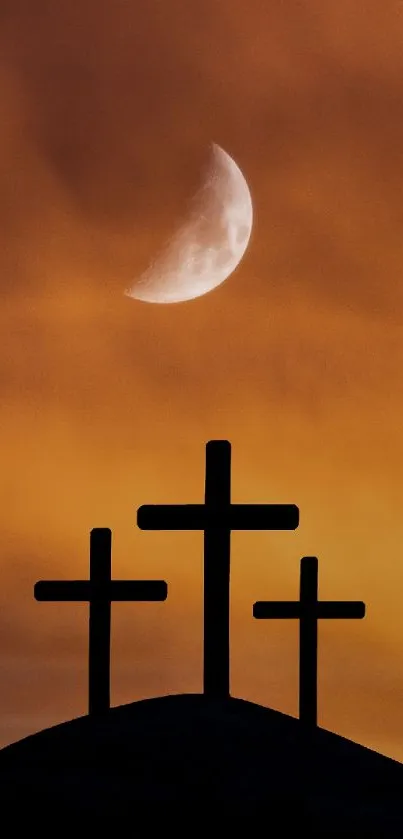 Three crosses silhouetted against an orange sky with a crescent moon.