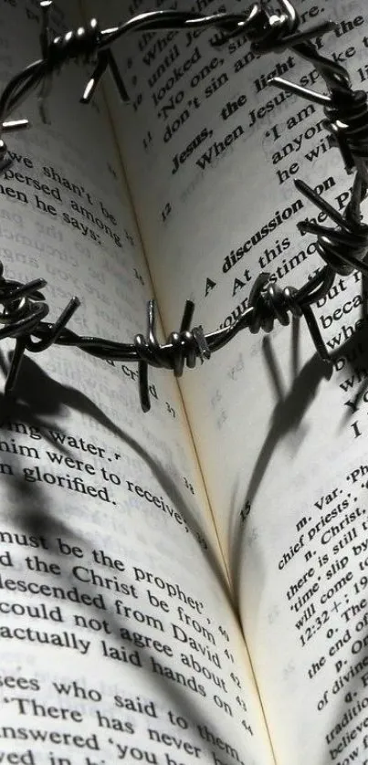 Crown of thorns shadow on book page.