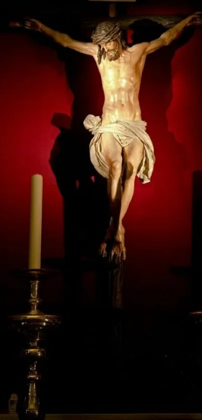 Crucifix with two candles on dark red background.