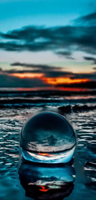 Crystal ball reflecting beach sunset with vibrant colors.