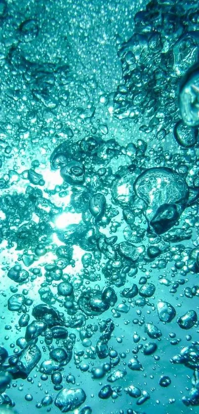 Mobile wallpaper with blue bubbles underwater.