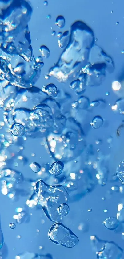 Crystal blue water droplets creating an abstract and vibrant splash effect.