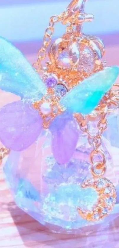 Crystal charm with butterfly and mystical design in pastel colors.