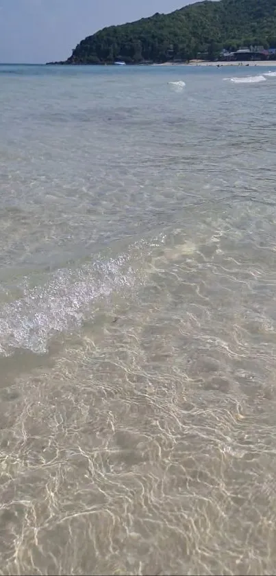 Clear beach waves with serene ocean view.