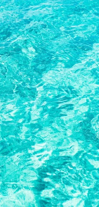 Mobile wallpaper featuring crystal clear blue ocean water, perfect for tranquility.