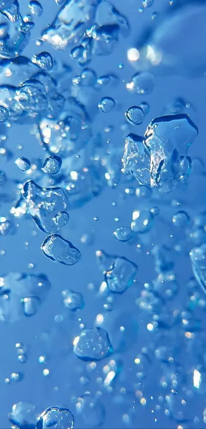 HD wallpaper of blue water droplets cascading beautifully.