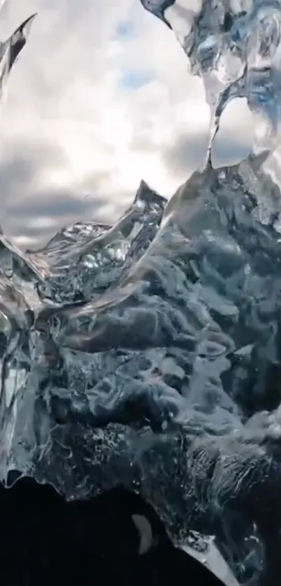 Abstract ice formation with cloudy sky backdrop.