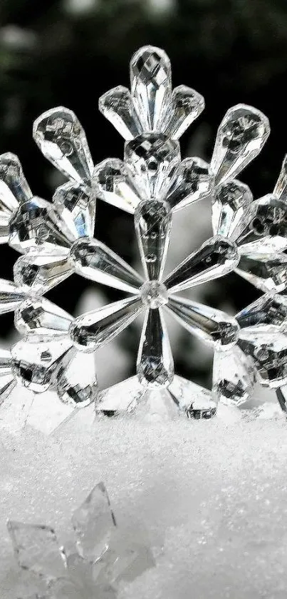 Elegant crystal snowflake on snowy background.