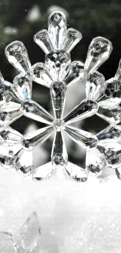Beautiful crystal snowflake on snowy background for mobile wallpaper.