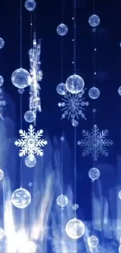 Crystal snowflakes hanging on a deep blue background, perfect for winter decor.