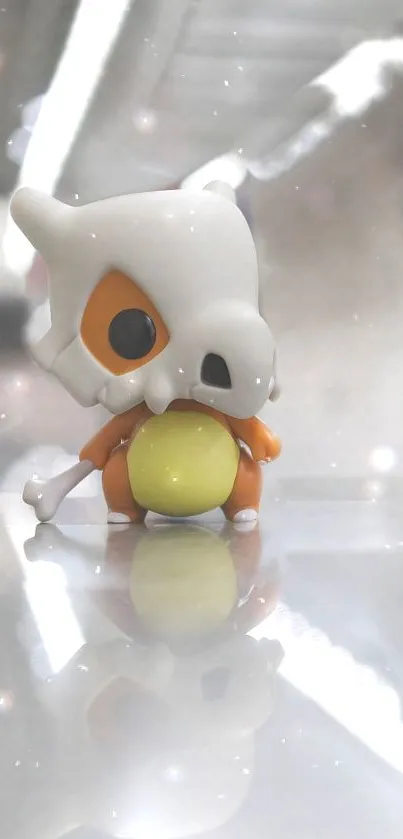 Cubone figurine reflecting on glossy surface with soft-focus background.