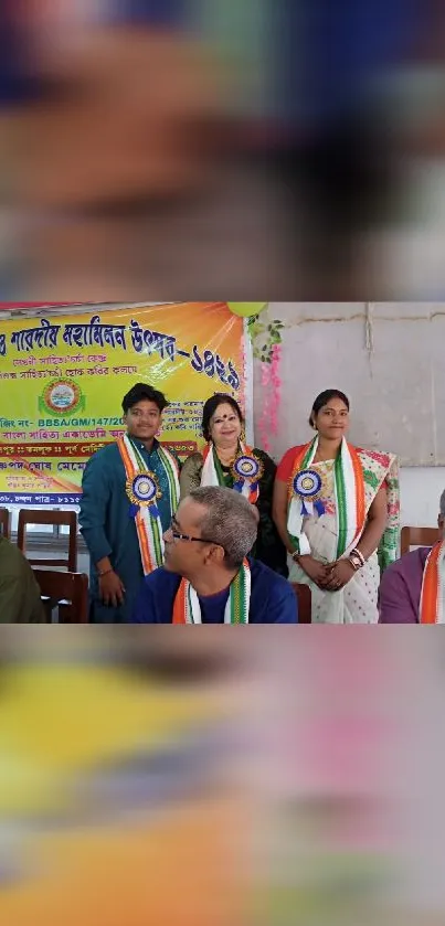 Vibrant cultural event with participants in colorful attire and banners.