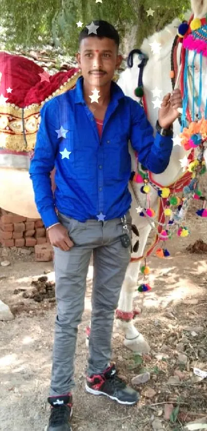 Man in blue shirt with colorful decorated horse.