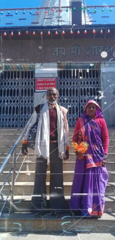 People in traditional wear at temple entrance.