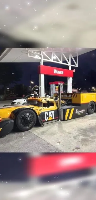 Custom truck parked at gas station under night sky with a distinctive design.