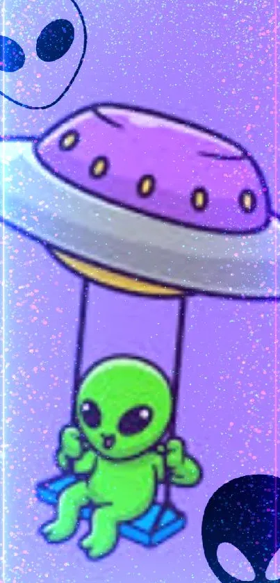 Cute green alien swinging from purple UFO on phone wallpaper.