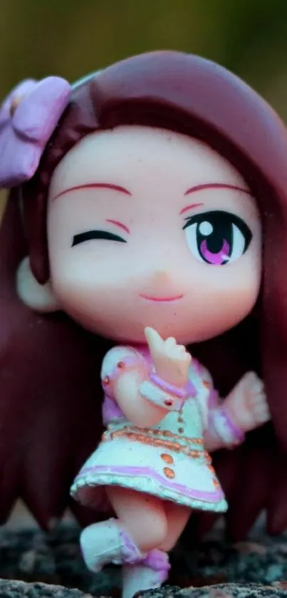 Cute anime figure with brown hair and vibrant colors.