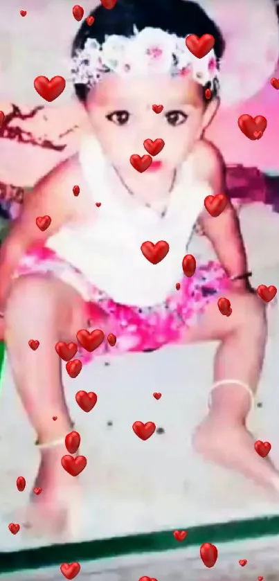 Adorable baby in floral skirt and headband sitting with a vibrant background.