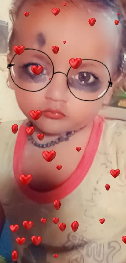 Baby with glasses filter on mobile wallpaper looking cute.