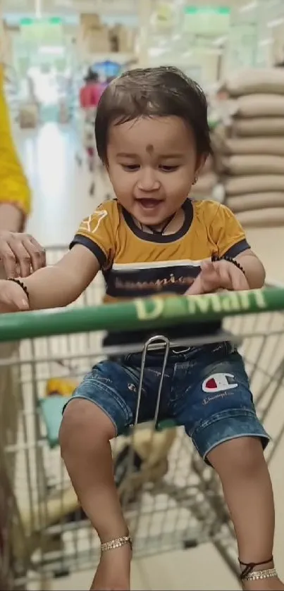 Adorable baby in shopping cart at supermarket.