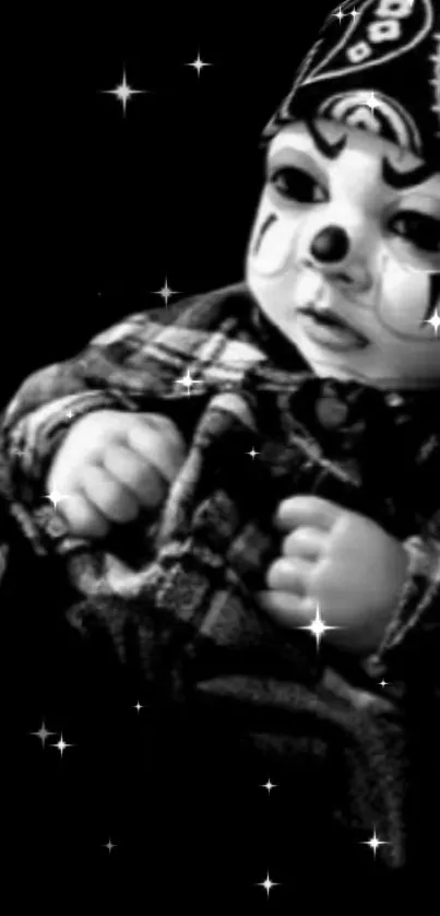 Cute black and white clown baby wallpaper with stars.