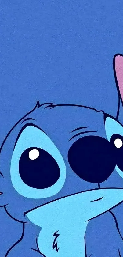 Cute blue cartoon character with large eyes on phone wallpaper.