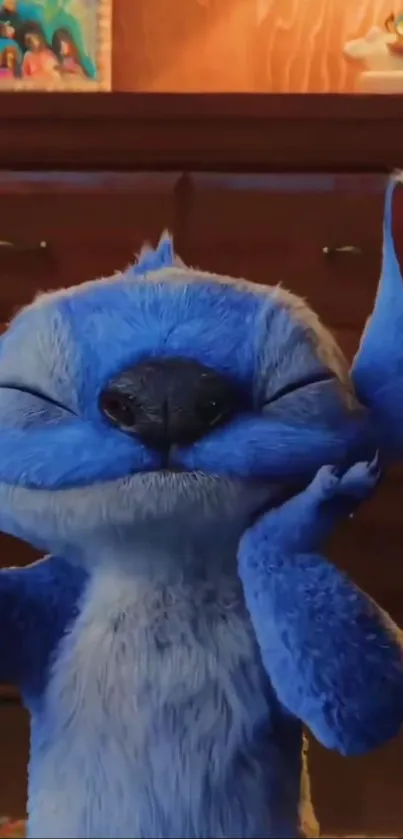 Cute blue cartoon character smiling in a cozy room.