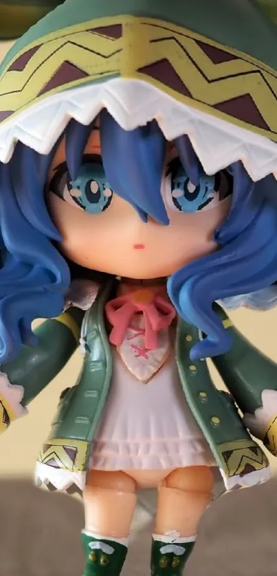 Charming blue-haired anime figure with green coat and detailed costume.