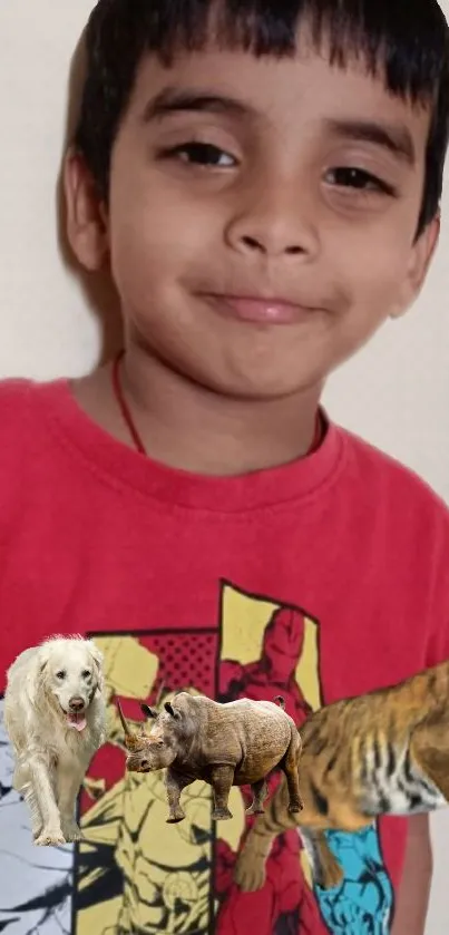 Smiling boy in a red superhero shirt with illustrated animals.