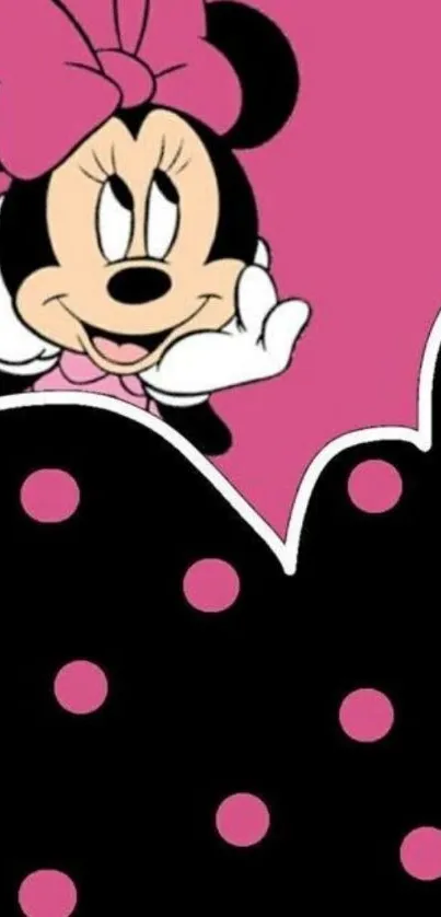 Adorable cartoon character on pink polka dot wallpaper.