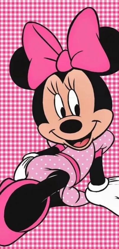 Cartoon character with pink bow on pink checkered background.