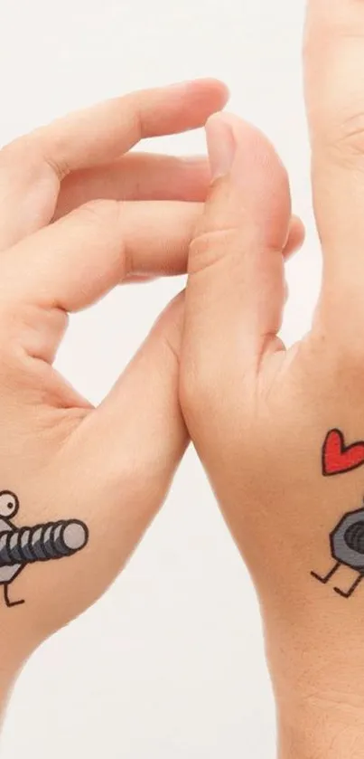 Cute cartoon nut and bolt tattoo with a heart on hands.