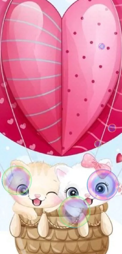 Cute cats in a pink heart balloon basket.