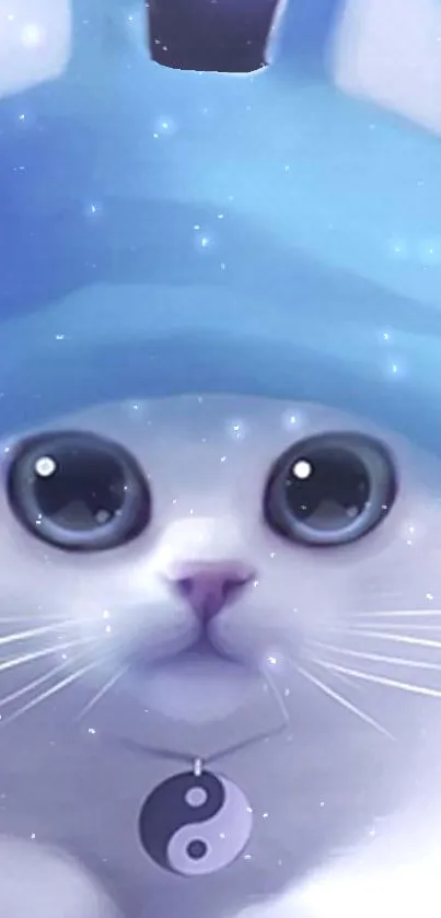 Adorable cat with blue hat and yin-yang charm on celestial background.