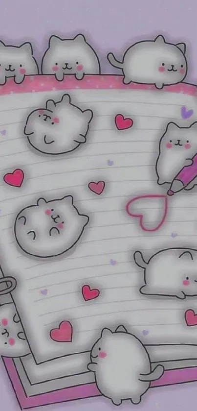 Cute cats on a pastel notebook with doodles and hearts.