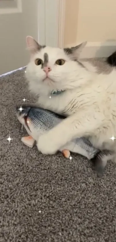 Cute cat cuddling a toy fish on carpet