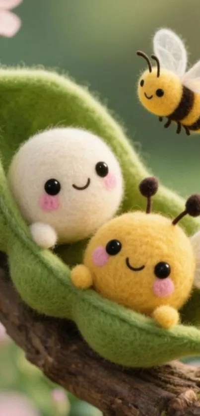 Felt characters with a bee on a green leaf.