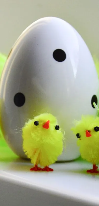 Yellow chicks with a polka dot egg in spring theme.