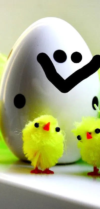 Adorable Easter egg with cute yellow chicks.