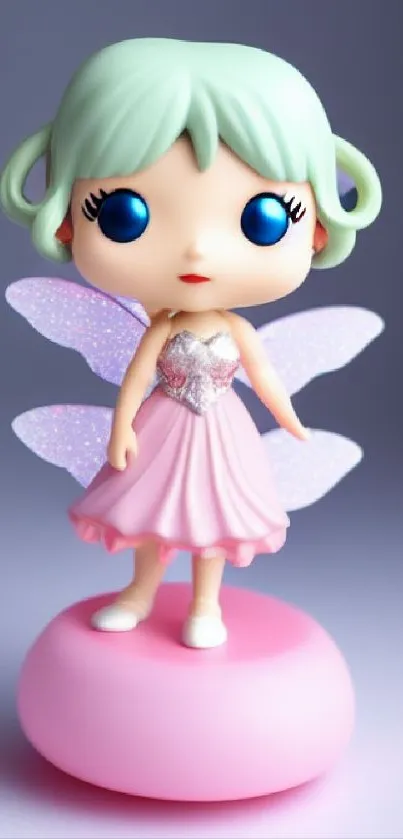 Cute fairy figurine on a pastel pink base with sparkling wings.